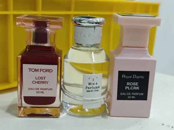 Comparatif visuel entre le parfum de luxe Tom Ford Lost Cherry et une alternative abordable en extrait de parfum.