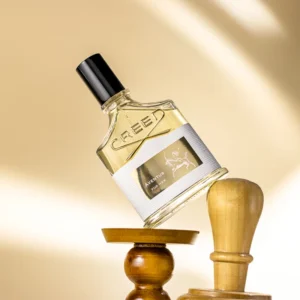 Comparaison entre le parfum de luxe Creed Aventus for Her et son dupe abordable de haute qualité en France.